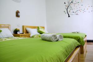 Phòng Bốn Người Có Phòng Tắm Riêng (Quadruple Room with Private Bathroom)