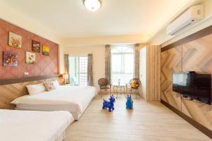 Phòng 4 người nhìn ra vườn (Quadruple Room with Garden View)