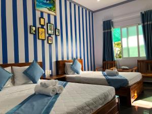 Phòng cho 3 người có Ban Công (Triple Room with Balcony)