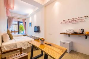 Phòng Bốn Người Có Phòng Tắm Riêng (Quadruple Room with Private Bathroom)