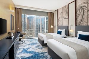 Deluxe Twin Room with Plaza View room in Wyndham Dubai Deira