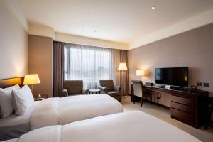 Phòng Hảo Hạng Có Hai Giường Đơn – Gồm Chỗ Đỗ Xe (Premium Room with 2 Single Beds - Parking Included)