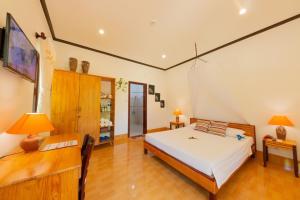 Phòng Bungalow Hướng vườn - Giường đôi (Garden View Bungalow - Double Bed)