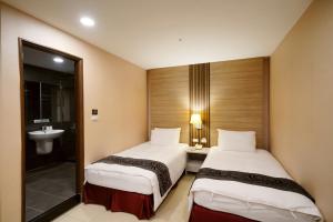 Phòng Tiêu chuẩn 2 Giường Đơn - không có cửa sổ (Standard Twin Room - no window)