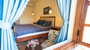 Phòng Deluxe Giường Đôi Có Ban Công (Deluxe Double Room with Balcony)