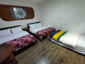 Phòng Tiêu Chuẩn 2 Giường Đơn Với Ghế Sofa (Standard Twin Room with Sofa)