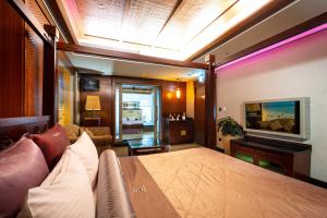 Phòng Có Giường Cỡ Queen Nhìn Ra Vườn (Queen Room with Garden View)