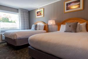 Queen Room with Two Queen Beds room in Marine Village Resort