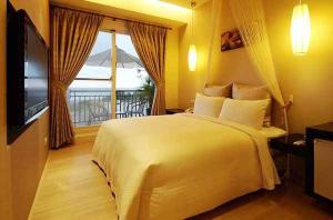 Phòng Giường Đôi có Ban công và Nhìn ra Biển (Double Room with Balcony and Sea View)