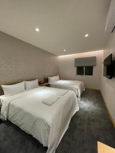 Phòng dành cho 4 Khách không có Cửa sổ (Quadruple Room without Window)