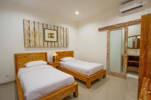 Phòng Hai Giường Đơn Loại Sang (Deluxe Twin Room)