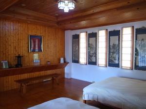 Phòng Bốn Người Có Phòng Tắm Riêng (Quadruple Room with Private Bathroom)