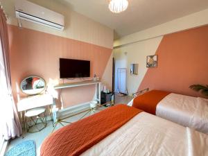 Phòng 4 người nhìn ra vườn (Quadruple Room with Garden View)