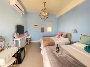 Phòng Deluxe 4 Người (Deluxe Quadruple Room)