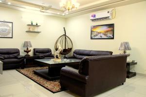 Three-Bedroom Apartment room in The Millenial Apartments & Suites Bahria Town