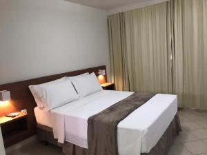 Deluxe Double Room with Side Sea View room in Pousada Laranja