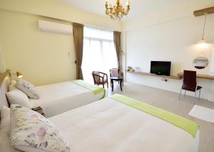 Phòng 4 Người Có Ban Công (Quadruple Room with Balcony)