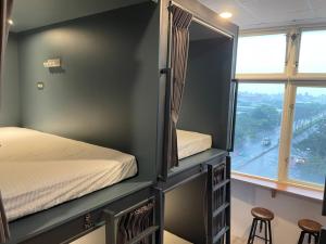 1 người trong phòng tập thể 12 giường – Nam & Nữ (1 Person in 12-Bed Dormitory - Mixed)