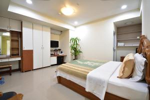 Suite Gia Đình Có Ban Công (Family Suite with Balcony)