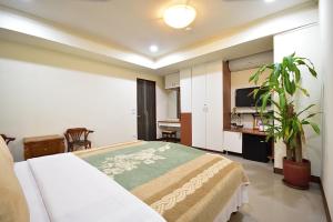 Suite Gia Đình Có Ban Công (Family Suite with Balcony)