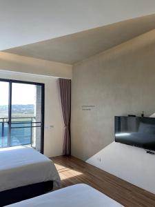 Phòng 4 Người Có Ban Công (Quadruple Room with Balcony)