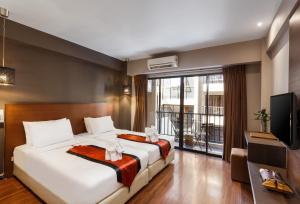 Superior Double or Twin Room - Roundtrip Airport Transfer room in The Cottage Suvarnabhumi