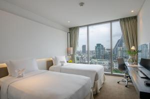 Deluxe Twin Room (Non ASQ) room in Amara Bangkok Hotel