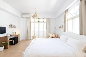 Phòng Loại Sang Hướng Núi Giường Đôi Có Ban Công (Deluxe Mountain View Double Room with Balcony)