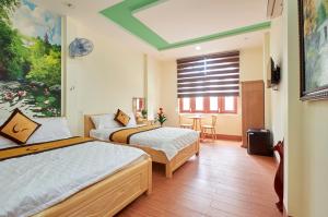 Phòng Deluxe 4 Người (Deluxe Quadruple Room)