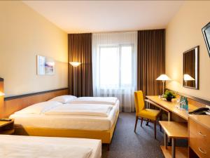Triple Room room in Plaza Hotel & Living Frankfurt