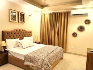 One-Bedroom Apartment room in The Millenial Apartments & Suites Bahria Town
