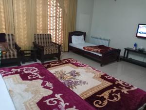 Double Room with Extra Bed room in Royal Manor