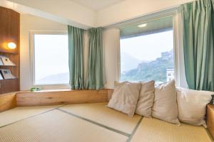 Phòng Deluxe hướng biển giường đôi (Deluxe Double Room with Sea View)