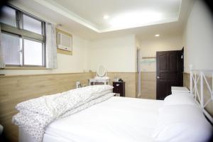 Phòng Deluxe Giường Đôi Nhìn Ra Biển Từ Phía Bên Cạnh (Deluxe Double Room with Side Sea View)