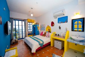 Phòng Deluxe Giường Đôi Với Ban Công và Tầm Nhìn Ra Biển (Deluxe Double Room with Balcony and Sea View)