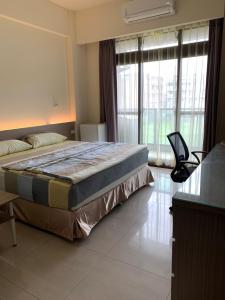Phòng Có Giường Cỡ Queen Nhìn Ra Vườn (Queen Room with Garden View)