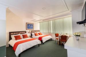 Deluxe Queen Room with Two Queen Beds room in Hotel Cordero