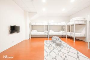 1 người trong phòng tập thể Cơ bản 8 giường - Nam & Nữ (1 Person in 8-Bed Basic Dormitory - Mixed)