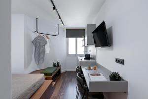 Deluxe Studio room in The Athenians Art Apartments