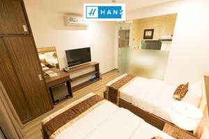Phòng Hai Giường Đơn Loại Sang (Deluxe Twin Room)