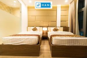 Phòng Hai Giường Đơn Loại Sang (Deluxe Twin Room)