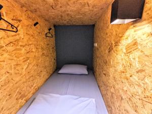 Giường trong Phòng ngủ tập thể cả Nam và Nữ 4 Người (Bed in 4-Bed Mixed Dormitory Room)
