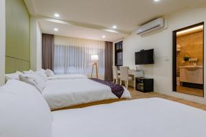Phòng gia đình với phòng tắm riêng. (Family Room with Private Bathroom)