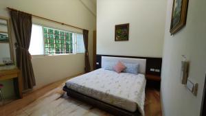 Phòng Có Giường Cỡ Queen Nhìn Ra Vườn (Queen Room with Garden View)