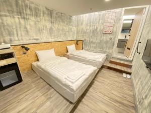 Phòng Hai Giường Đơn Tiêu Chuẩn không có Cửa Sổ (Standard Twin Room without Window)