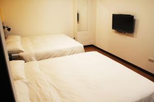 Phòng Tiêu chuẩn 4 Người - Không có Cửa sổ (Standard Quadruple Room - No Window)