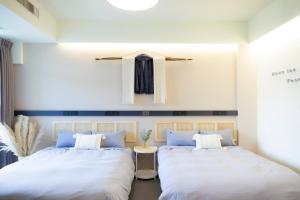 Phòng Deluxe Có 2 Giường Cỡ Queen (Deluxe Queen Room with Two Queen Beds)