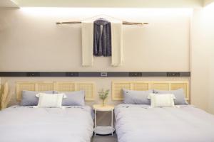 Phòng Deluxe Có 2 Giường Cỡ Queen (Deluxe Queen Room with Two Queen Beds)