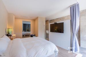 Phòng 4 người nhìn ra vườn (Quadruple Room with Garden View)