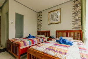 Phòng Hai Giường Đơn Loại Sang (Deluxe Twin Room)